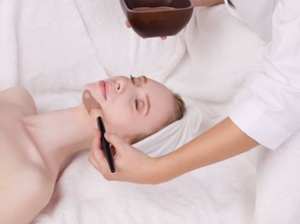 Woman getting a facial